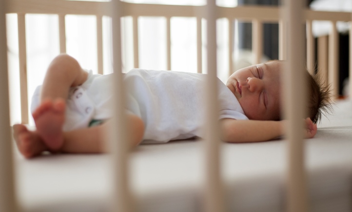 SDIS baby sleeping in crib